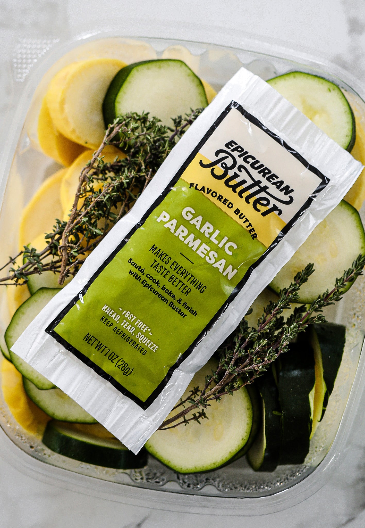 Epicurean Butter Garlic Parmesan 1oz squeeze packet with fresh cut veggies
