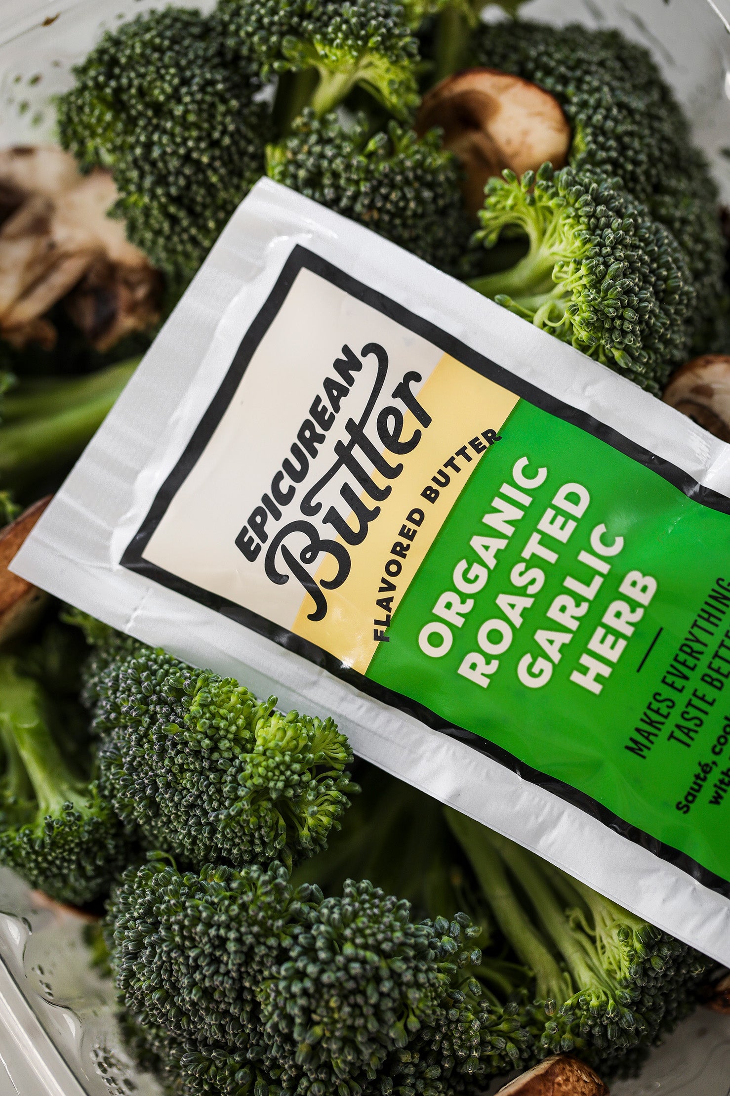 Epicurean Butter Organic Roasted Garlic Herb 1oz squeeze packet with fresh broccoli