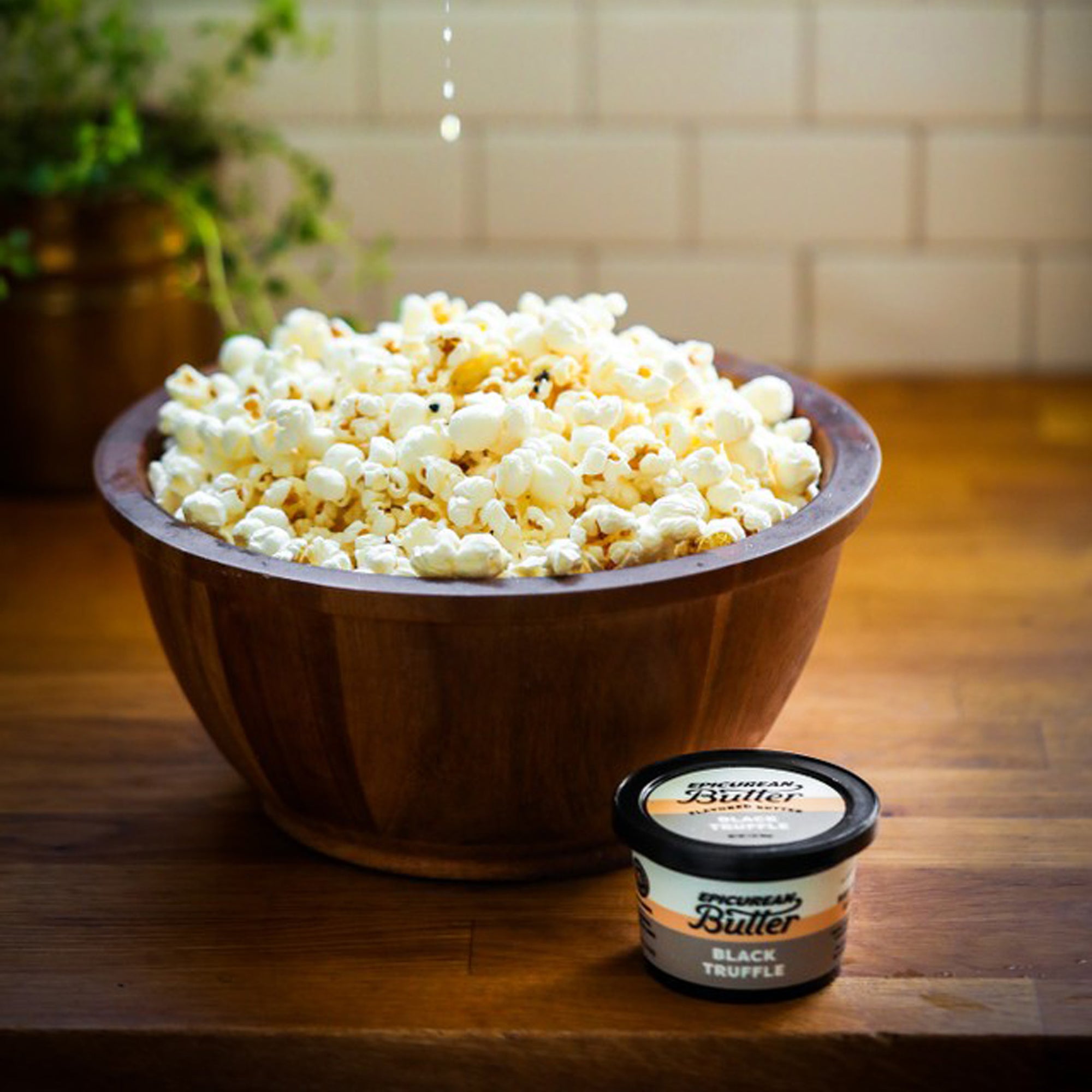Popcorn drizzled with Black Truffle Flavored Butter