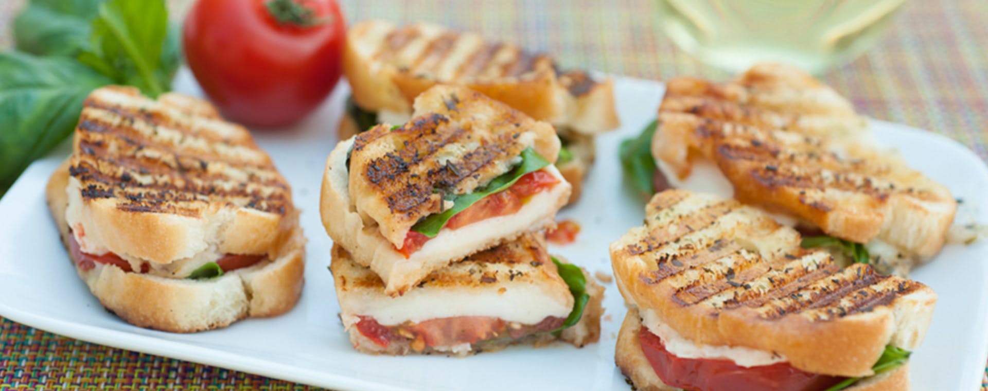 Caprese Sandwiches made with Epicurean Butter Tuscan Herb Flavored Butter