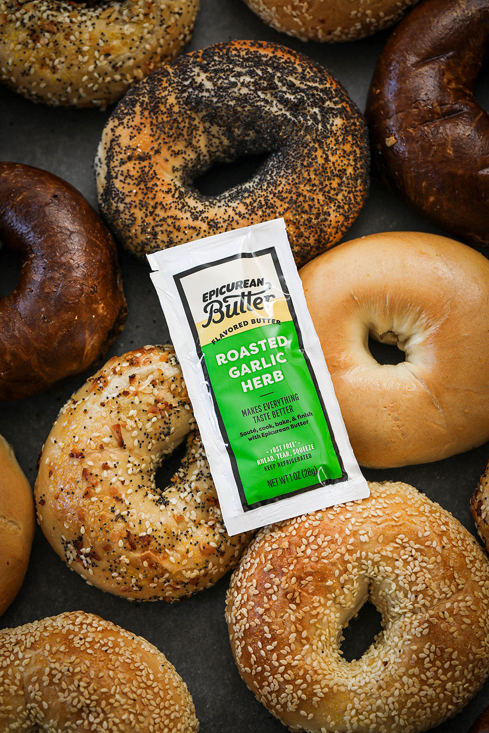 Epicurean Butter Roasted Garlic Herb Flavored Butter squeeze packet with bagels