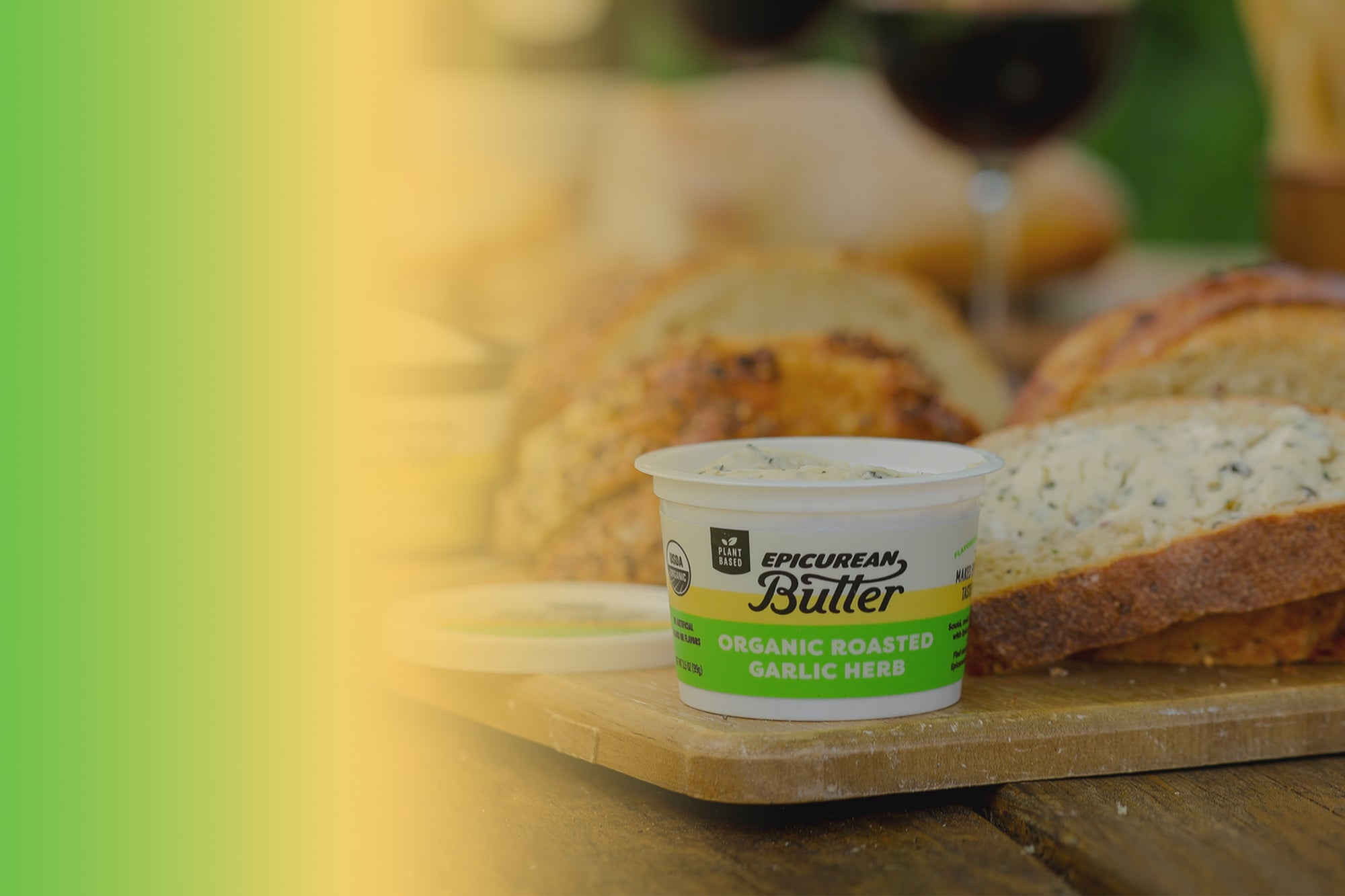 Epicurean Butter Plant Based Organic Roasted Garlic Herb Flavored Butter with wine and bread