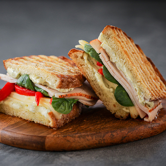 Grey Poupon Dijon Butter on a Sandwich